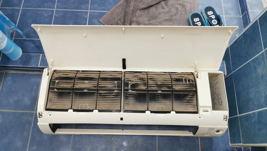 Daikin air conditioner displaying error code J8 in a modern home setting, highlighting troubleshooting and maintenance solutions.